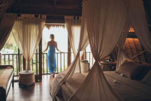 A woman standing in a luxury hotel room