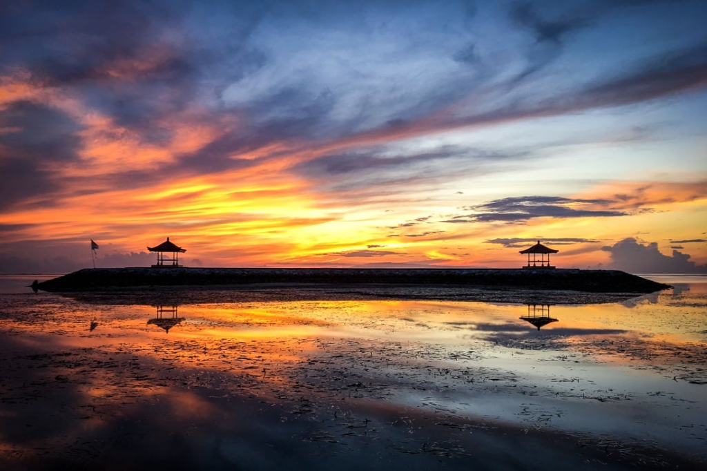 A sunrise in Bali over Sanur's beach