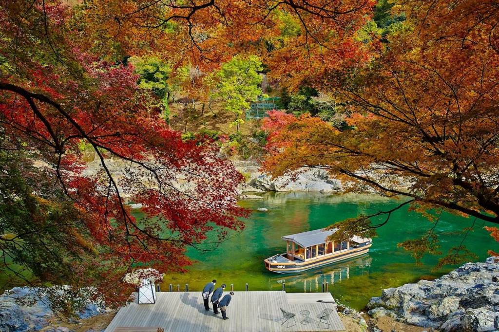 A romantic boat on a lake and trees in Japan