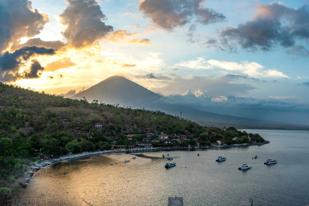 Amed beach and ocean with the mountain in the background