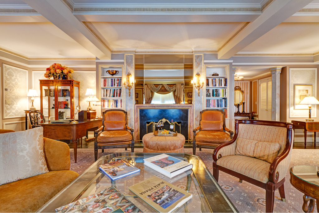 A presidential suite room in a hotel decorated with royal decor